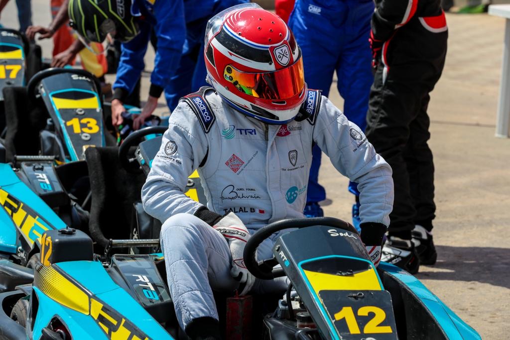 Talal Beshara climbing into kart number 12