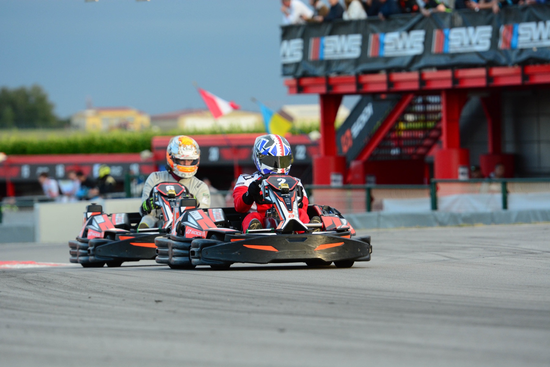 Talal Beshara racing wheel to wheel in a kart